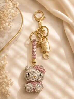 Louis Vuitton Gold Lock 🔒 Authentic LV Key + Unbranded Hello Kitty Bag Charm